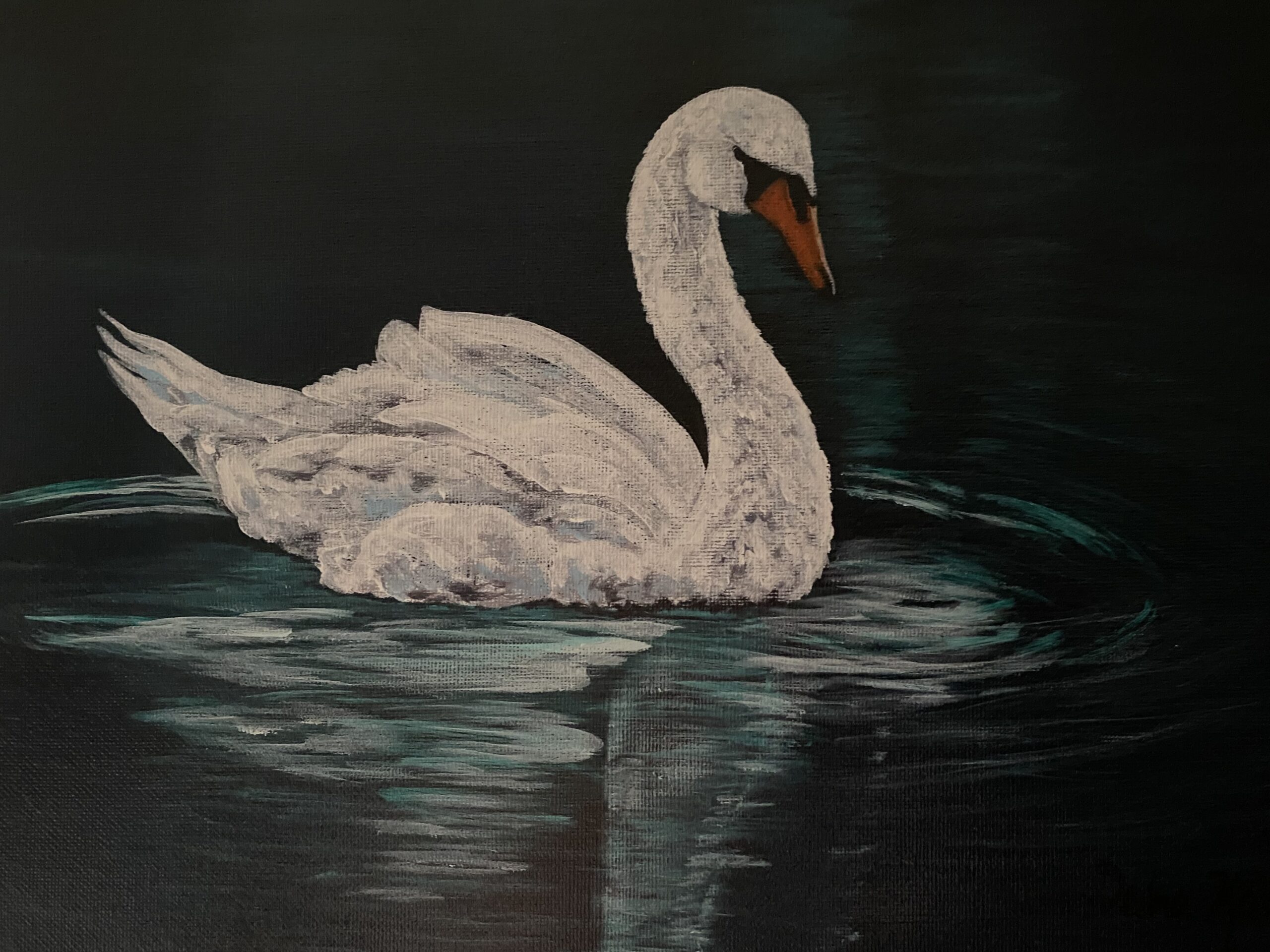white swan on aqua lake back ground