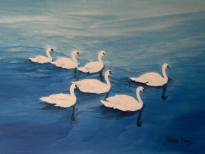 seven white swimming swans 